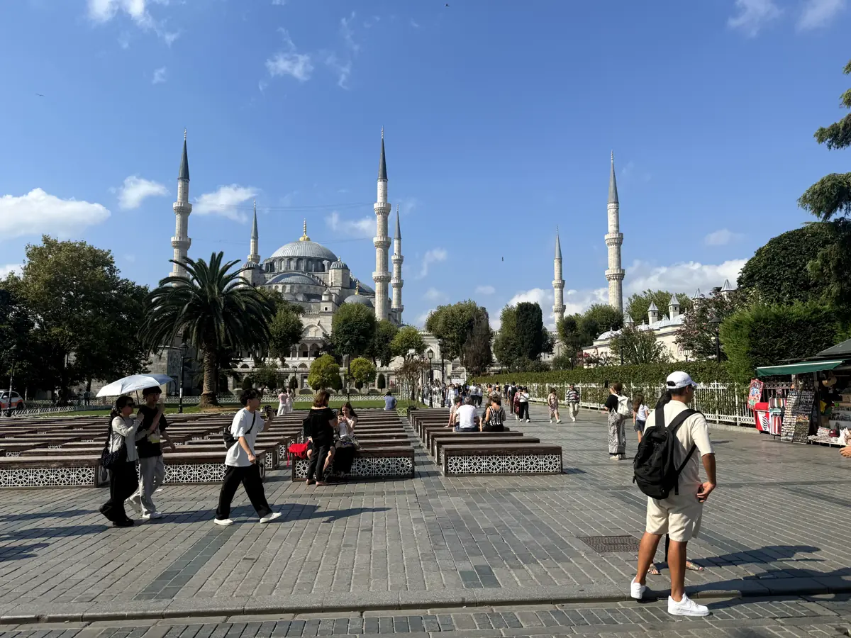 The Blue Mosque's domes and six minarets under a clear October sky in Sultanahmet, Istanbul